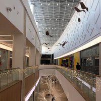 Architectural paper birds for decorations of the mall 