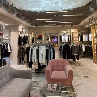 Interior design of a clothes store. Wave ceiling® 