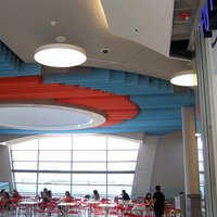 Multicolored lamella ceilings for cafe 