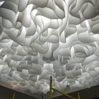 Wave ceiling system in a lobby of a sanatorium 